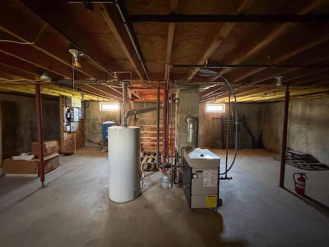 111 Fryes Ln, Greenbush, ME 04418 - below grade area with gas water heater, a water pressure tank, and a heating unit