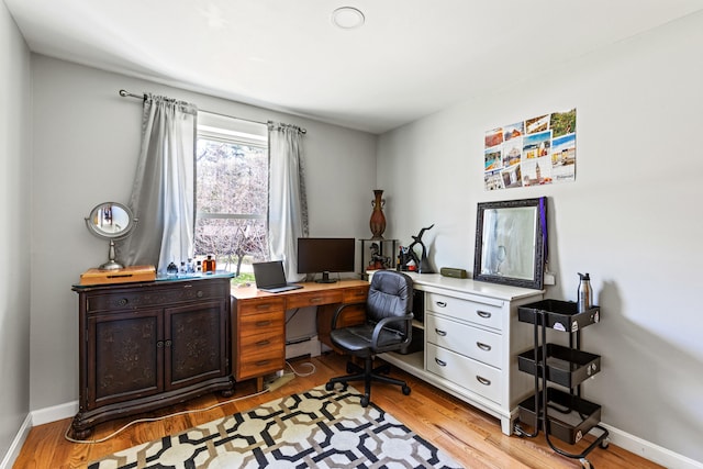 48 Albion Rd, Windham, ME 04062 - office with light wood-style flooring, baseboards, and a baseboard heating unit