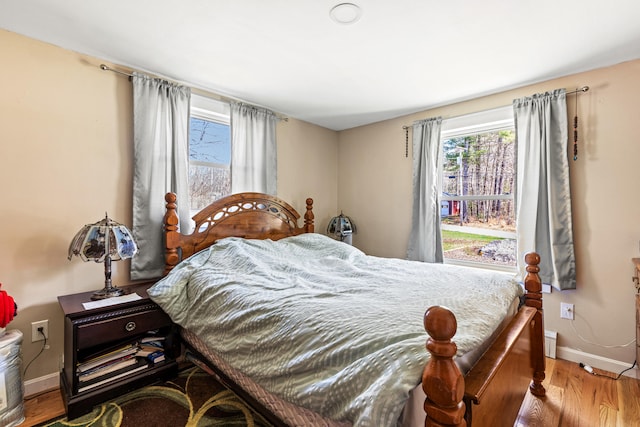 48 Albion Rd, Windham, ME 04062 - bedroom with baseboards and wood finished floors