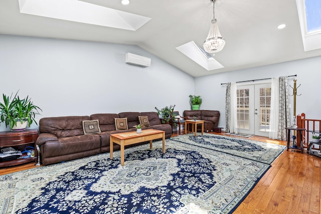 48 Albion Rd, Windham, ME 04062 - living room featuring a skylight, wood finished floors, lofted ceiling, french doors, and recessed lighting