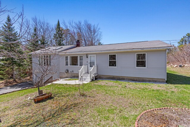 48 Albion Rd, Windham, ME 04062 - single story home with a front yard and a chimney