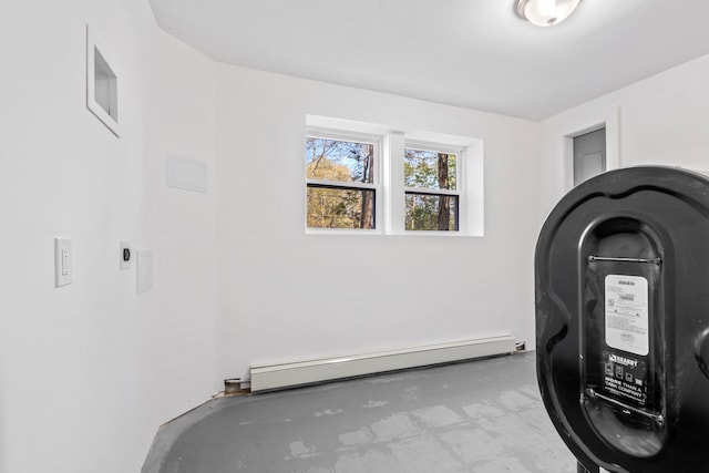 exercise area with baseboard heating
