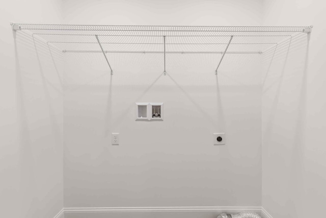 26 June St, Sanford, ME 04073 - washroom featuring washer hookup, hookup for an electric dryer, and baseboards