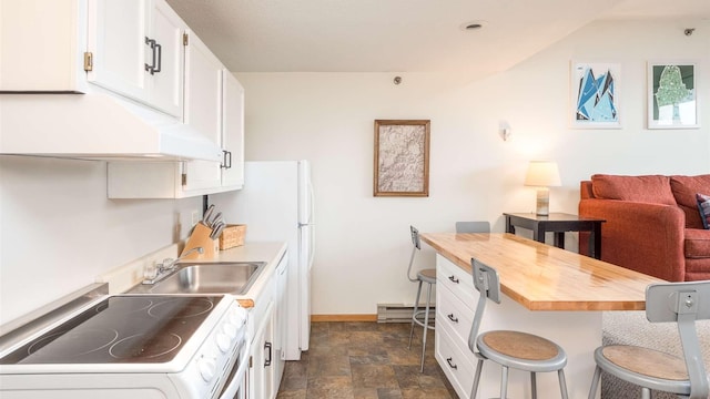 8 Sunrise Dr Unit A115, Newry, ME 04261 - kitchen featuring wooden counters, a breakfast bar area, stone finish flooring, electric range oven, and under cabinet range hood