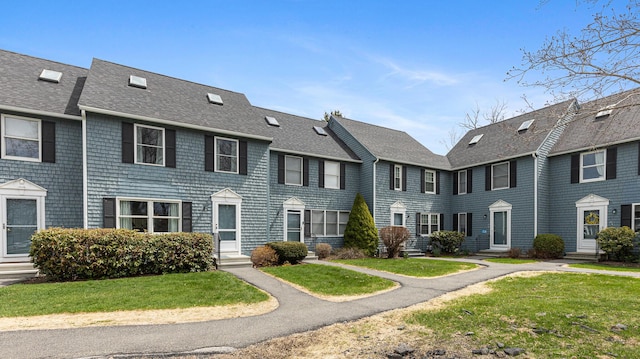 8 Orchard Hills Pkwy Unit 8, Bangor, ME 04401 - view of front of property featuring entry steps, roof with shingles, and a front lawn