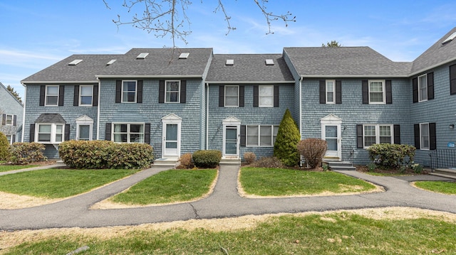 8 Orchard Hills Pkwy Unit 8, Bangor, ME 04401 - view of front of house with a front lawn and a shingled roof