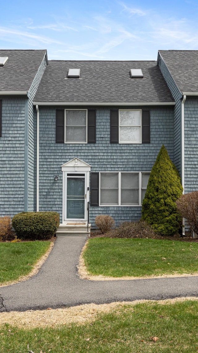 8 Orchard Hills Pkwy Unit 8, Bangor, ME 04401 - view of front of house with roof with shingles and a front lawn