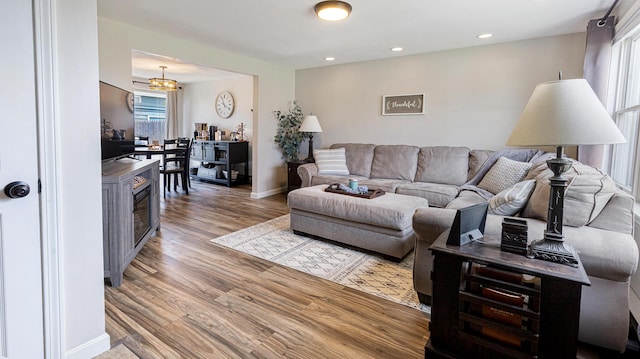 8 Orchard Hills Pkwy Unit 8, Bangor, ME 04401 - living area with wood finished floors, healthy amount of natural light, a fireplace, baseboards, and recessed lighting