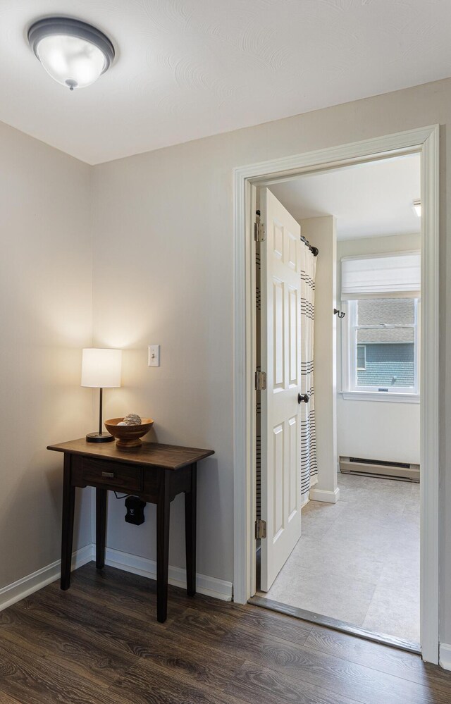 8 Orchard Hills Pkwy Unit 8, Bangor, ME 04401 - hallway with wood finished floors, baseboard heating, and baseboards