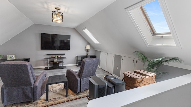 8 Orchard Hills Pkwy Unit 8, Bangor, ME 04401 - living area with a skylight, wood finished floors, and lofted ceiling
