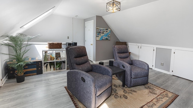 8 Orchard Hills Pkwy Unit 8, Bangor, ME 04401 - living area featuring vaulted ceiling and light wood finished floors