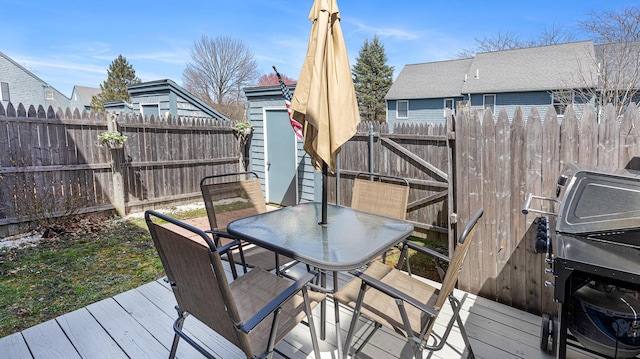 8 Orchard Hills Pkwy Unit 8, Bangor, ME 04401 - deck featuring a fenced backyard, outdoor dining area, and a grill