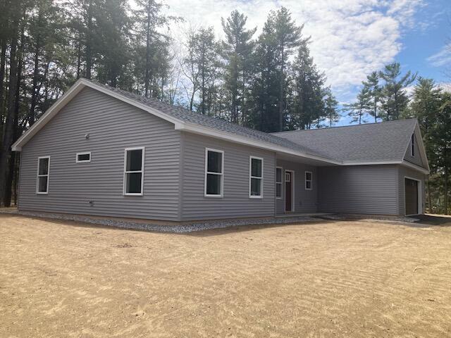 ranch-style house featuring an attached garage