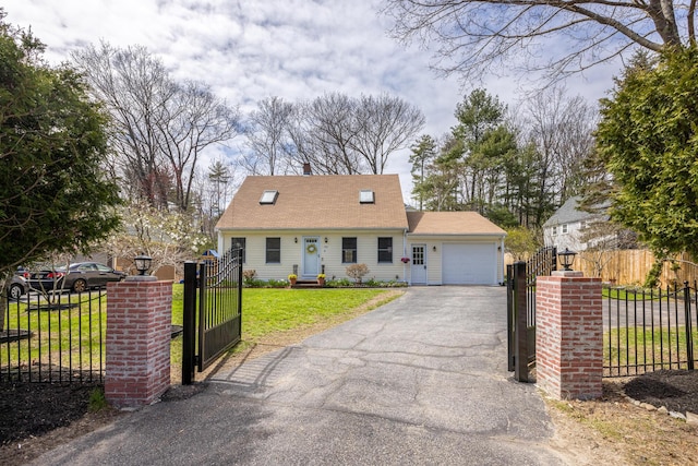 784 Ocean Ave, Portland, ME 04103 - cape cod home featuring an attached garage, asphalt driveway, and a gate