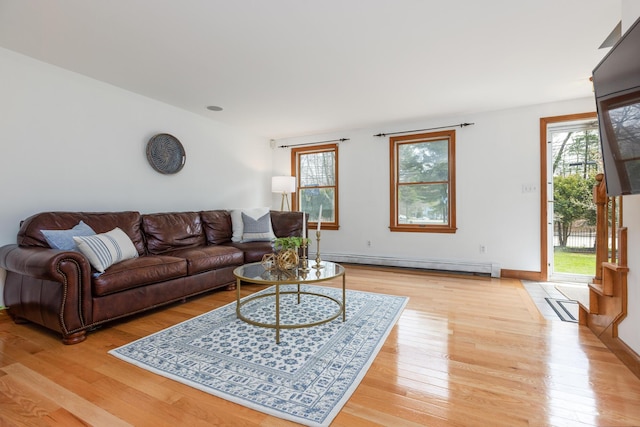 784 Ocean Ave, Portland, ME 04103 - living room featuring a baseboard radiator and light wood finished floors
