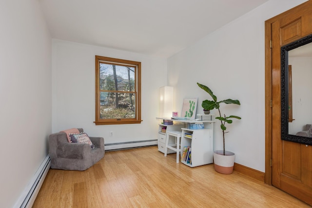 784 Ocean Ave, Portland, ME 04103 - sitting room featuring baseboard heating and wood finished floors