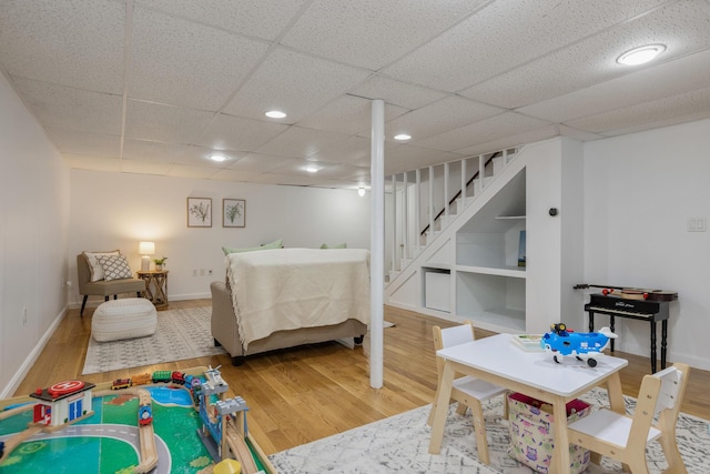 784 Ocean Ave, Portland, ME 04103 - bedroom featuring wood finished floors, a paneled ceiling, baseboards, and recessed lighting