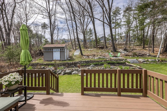 784 Ocean Ave, Portland, ME 04103 - wooden deck with an outbuilding, a lawn, and a storage shed