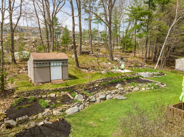 784 Ocean Ave, Portland, ME 04103 - view of grassy yard with a storage shed and an outdoor structure
