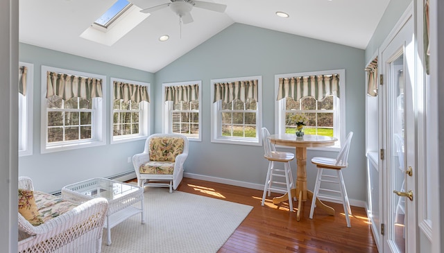 74 Town Farm Rd, Hampden, ME 04444 - sunroom featuring lofted ceiling, baseboard heating, and a skylight