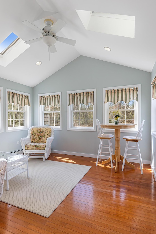 74 Town Farm Rd, Hampden, ME 04444 - sunroom featuring a skylight and lofted ceiling