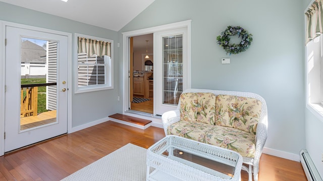 74 Town Farm Rd, Hampden, ME 04444 - sunroom featuring baseboard heating and lofted ceiling