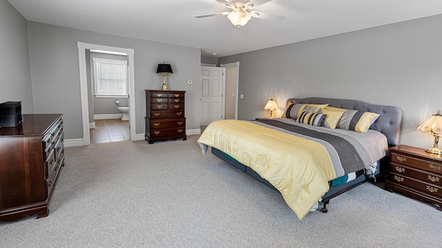 74 Town Farm Rd, Hampden, ME 04444 - carpeted bedroom featuring ensuite bathroom, ceiling fan, and baseboards