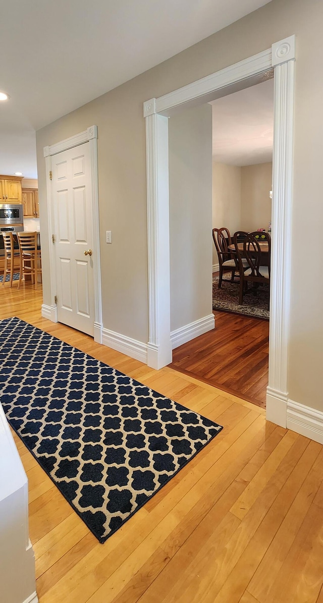 74 Town Farm Rd, Hampden, ME 04444 - foyer entrance featuring light wood finished floors and baseboards