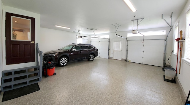 74 Town Farm Rd, Hampden, ME 04444 - garage featuring a garage door opener