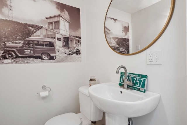17 Pine St Unit 3, Portland, ME 04102 - half bath with a sink and toilet