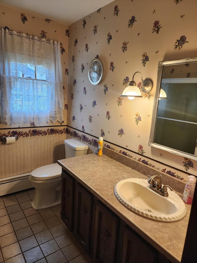 bathroom featuring toilet, wallpapered walls, tile patterned floors, vanity, and a baseboard radiator