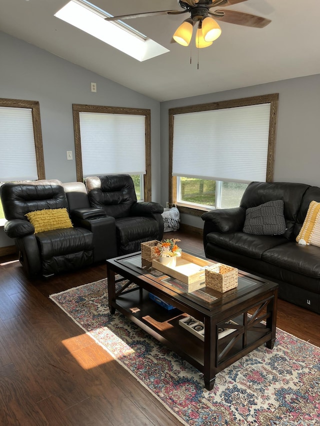 168 Guzzle Rd, Gouldsboro, ME 04607 - living area featuring a ceiling fan, vaulted ceiling with skylight, and wood finished floors