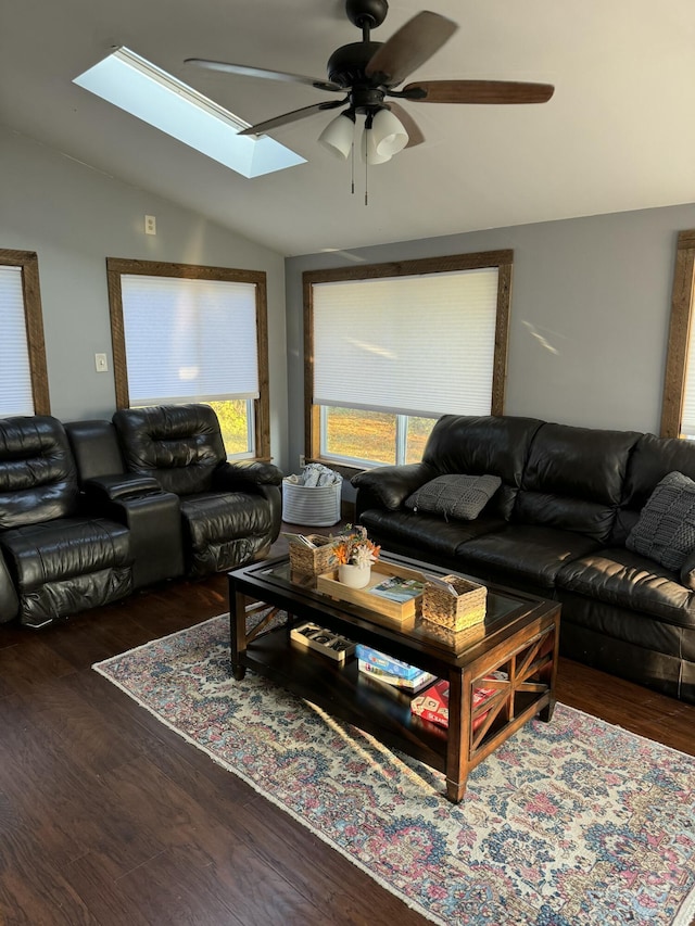 168 Guzzle Rd, Gouldsboro, ME 04607 - living room featuring plenty of natural light, ceiling fan, vaulted ceiling with skylight, and wood finished floors