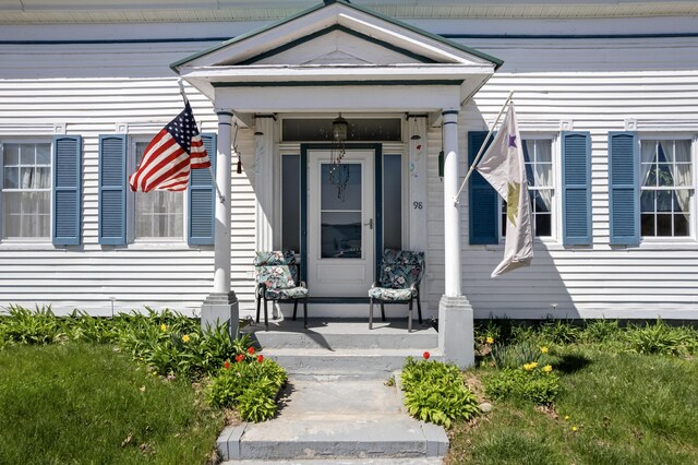 98 Main St, Winthrop, ME 04364 - property entrance with a porch