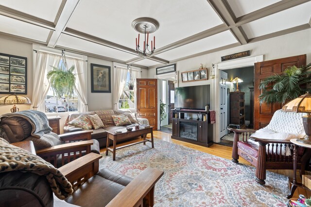 98 Main St, Winthrop, ME 04364 - living room with coffered ceiling, light wood finished floors, and beam ceiling