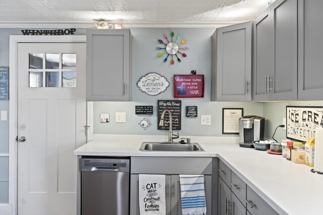 98 Main St, Winthrop, ME 04364 - kitchen with gray cabinetry, stainless steel dishwasher, a sink, and light countertops