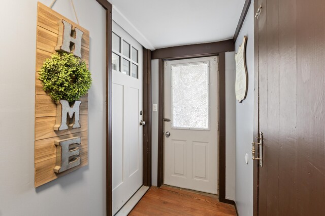 98 Main St, Winthrop, ME 04364 - doorway to outside with wood finished floors