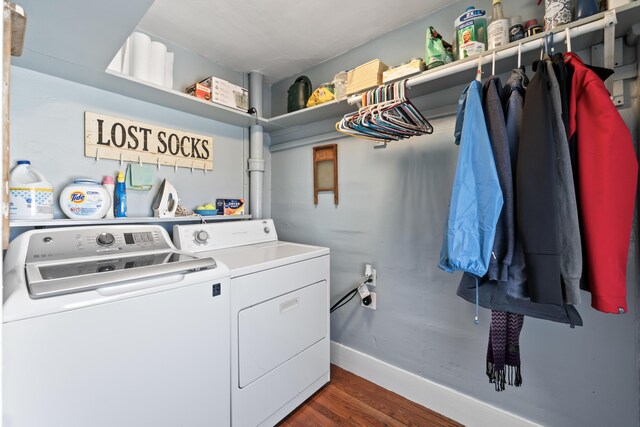 98 Main St, Winthrop, ME 04364 - washroom with separate washer and dryer, dark wood-type flooring, and baseboards