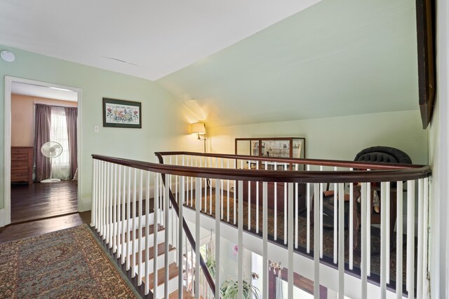 98 Main St, Winthrop, ME 04364 - hallway with an upstairs landing, wood finished floors, and lofted ceiling