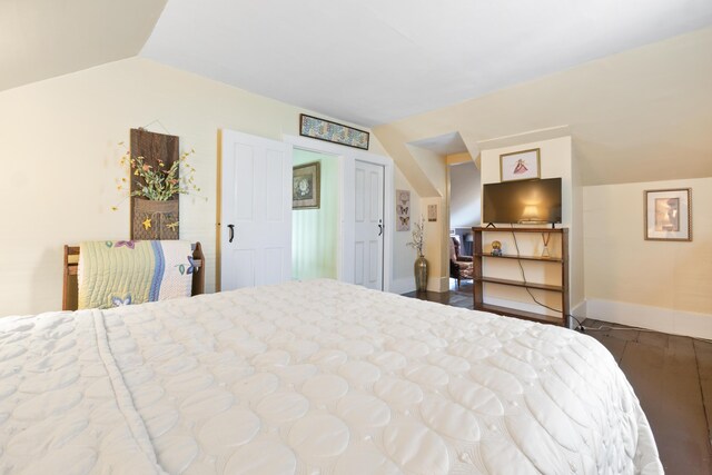 98 Main St, Winthrop, ME 04364 - bedroom with vaulted ceiling and baseboards