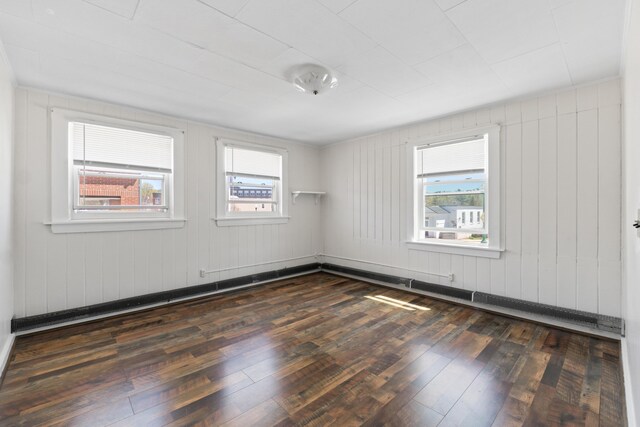 98 Main St, Winthrop, ME 04364 - empty room with dark wood finished floors