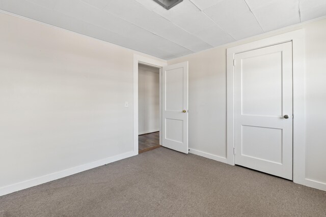 98 Main St, Winthrop, ME 04364 - unfurnished bedroom featuring carpet flooring and baseboards