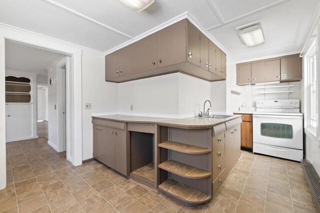 98 Main St, Winthrop, ME 04364 - kitchen with electric range, a sink, open shelves, light countertops, and stone finish flooring