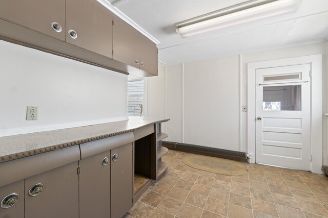 98 Main St, Winthrop, ME 04364 - kitchen with stone finish floors and light countertops