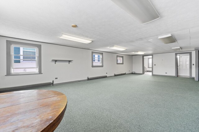 98 Main St, Winthrop, ME 04364 - misc room with carpet floors, baseboards, and a baseboard heating unit
