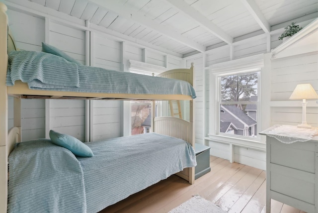 60 Grove St, Wells, ME 04090 - bedroom featuring beamed ceiling and wood finished floors