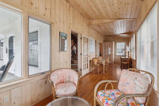 60 Grove St, Wells, ME 04090 - sunroom with lofted ceiling, wood walls, and wood finished floors