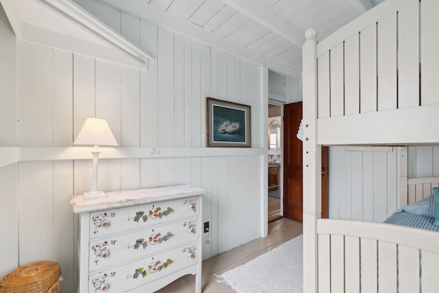60 Grove St, Wells, ME 04090 - bedroom with wood walls and beam ceiling