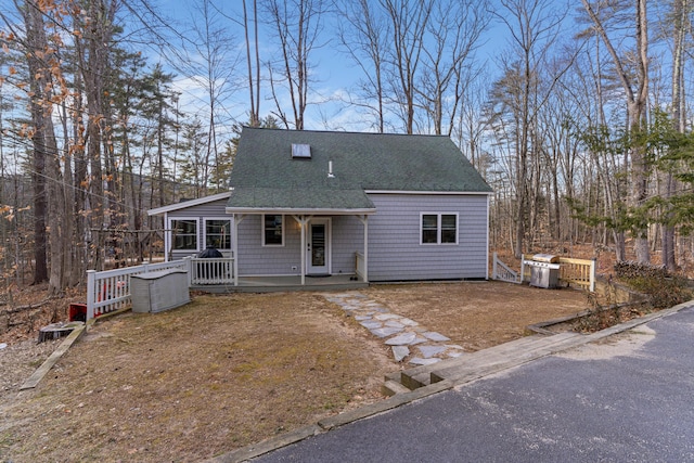 397 New Bridge Rd, Acton, ME 04001 - view of front of property with a shingled roof and a porch