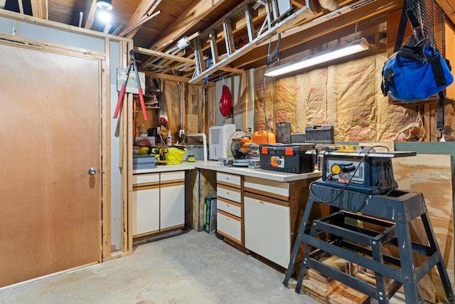 397 New Bridge Rd, Acton, ME 04001 - unfinished below grade area featuring a workshop area
